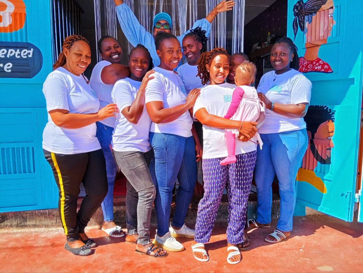 Bitcoin Babies mothers and team outside Joyce's Beauty Secrets salon