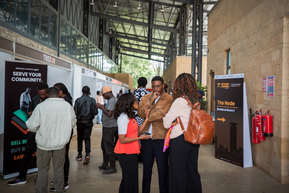 Attendees at the exhibitor booths