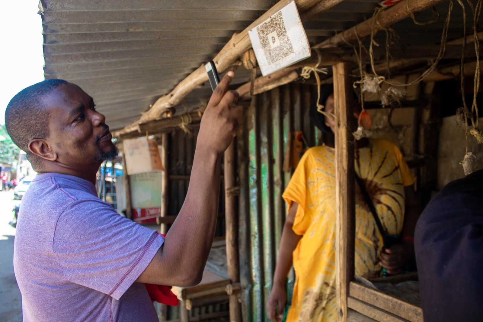 Bitcoin payment at a Kibera stall — Afribit Kibera
